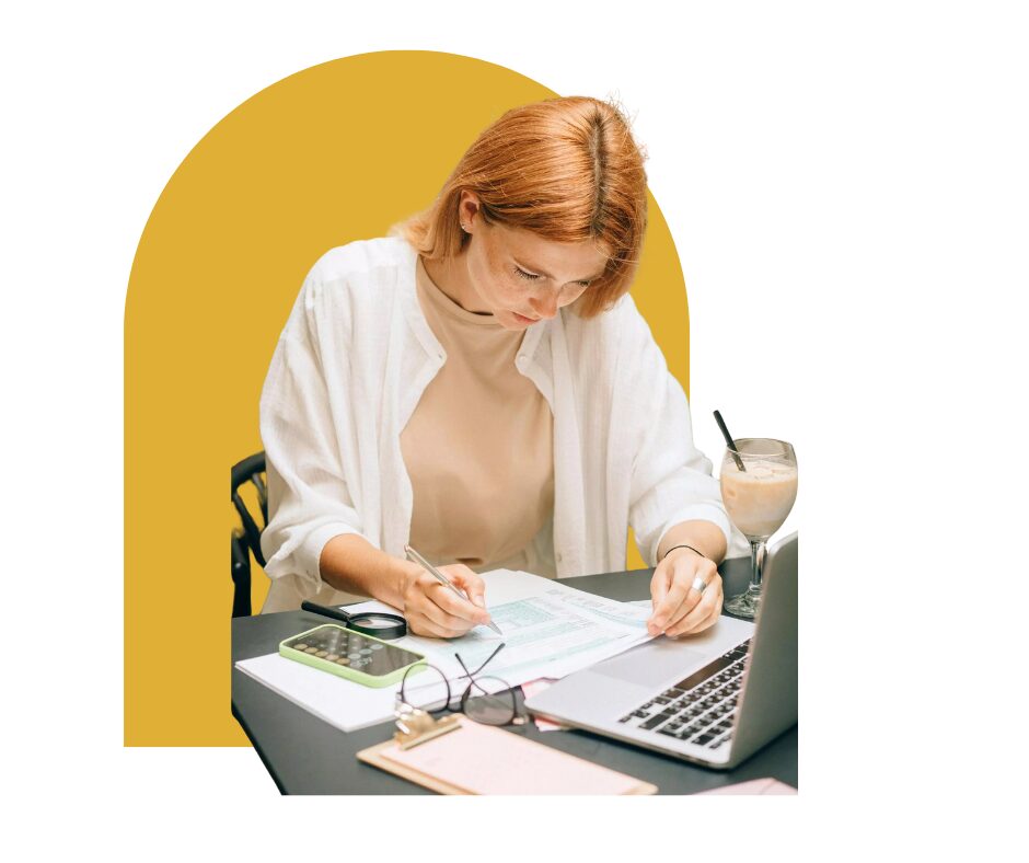 Focused Professional Taking an Online Cost Control Course Woman calculating finances at a laptop, representing hands-on learning in an online cost control and budgeting course
